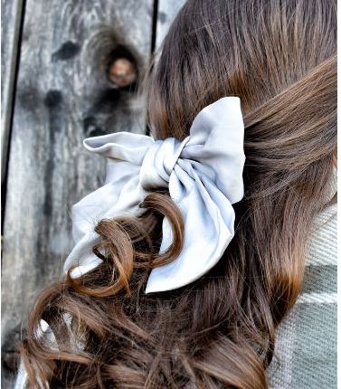 Tied Back Hair With Bow